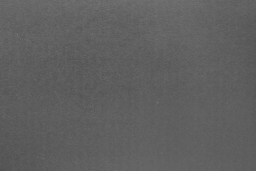 The black paper texture background and space for text.