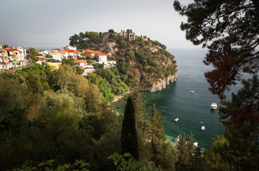 the city of Parga, by the mediterranean sea, with it's houses and boats in the pier