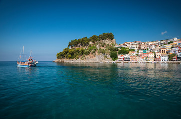 the city of Parga, by the mediterranean sea, with it's houses and boats in the pier