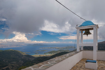 Prophet Elias Holy Temple, an orthodox church is standing up the hill in a greek landscape
