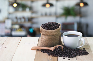 Obraz na płótnie Canvas Hot Coffee cup on the wooden table
