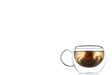 Green Chinese tea flower bud blooming in glass teapot Copy space for the ads