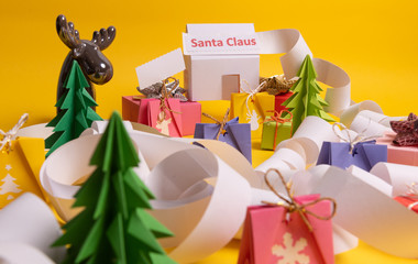 Fototapeta premium Christmas or New Year background, plain composition made of Xmas decorations and fir branches, flat lay, blank space for a greeting text