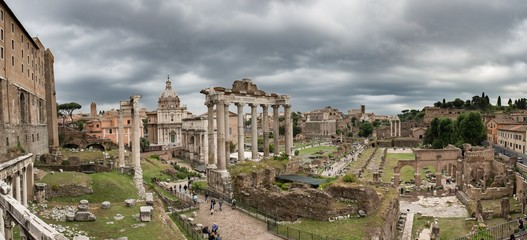 Fototapeta na wymiar roman forum on a cloudy day ruins ancient architecture rome