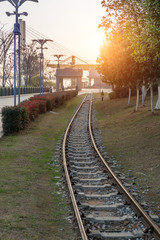 Obraz premium Cargo train platform at sunset with container