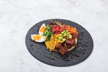 Poke bowl with moshroom, rice, agg and vegetables