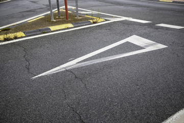 Give way sign on the asphalt