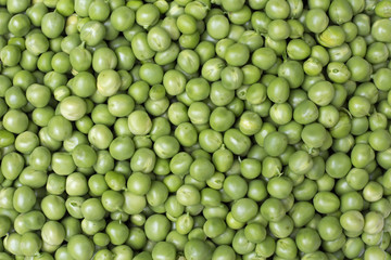 Fresh green peas background texture