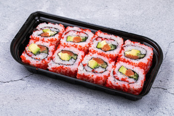 Sushi roll sushi with prawn, avocado, cream cheese, sesame. Sushi menu. Japanese food.