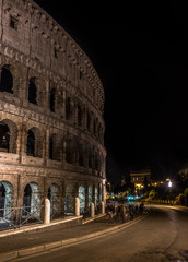 Fototapeta na wymiar night photography most popular building in rome colosseum ancient architecture