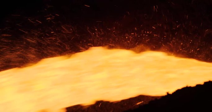 Metal that melts at high temperature and looks like lava. Blast furnace and melting furnace at Thyssenkrupp. Shot on a RED camera with Otus lenses.
