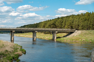 Fototapeta premium Concrete auto bridge over the river