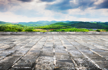 Empty rocky pavement and clean and comfortable autumn natural landscape.