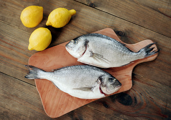 fresh fish on a wooden board