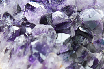 Purple Crystal Stone macro mineral. Purple rough amethyst quartz crystals geode
