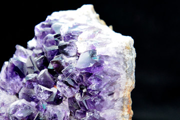 Purple Crystal Stone macro mineral. Purple rough amethyst quartz crystals geode