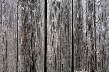 Weathered rustic wood planks with nails.