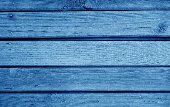 Wooden planks background in navy blue color.