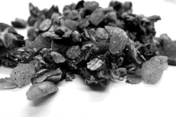 Tasty granola close-up with blur effect in black and white.