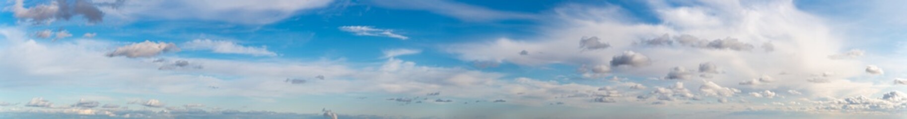 Fantastic clouds against blue sky, panorama © StepStock