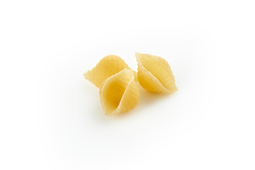 Italian raw dry pasta conchiglie rigate isolated on white background