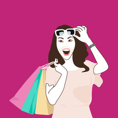 Woman holding shopping bags with sunglasses