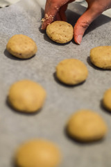 Placing cookies to be backed close up