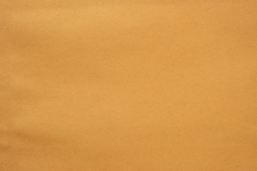Texture of brown craft paper or kraft paper background.