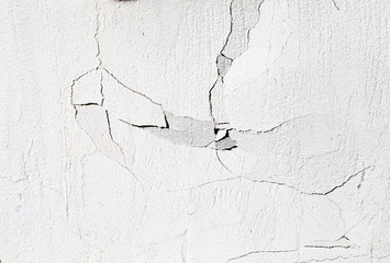 Cracked wall texture. Detailed white cement wall surface as a background