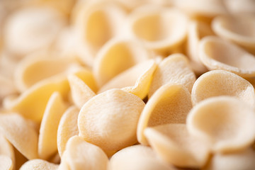 dried italian orecchiette pasta blur defocused