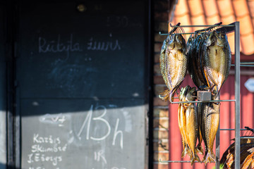 Dried smoked spiced mackerel fresh fish in a fish market