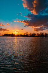 Beautiful sunset with reflections near Plattling, Isar, Bavaria, Germany