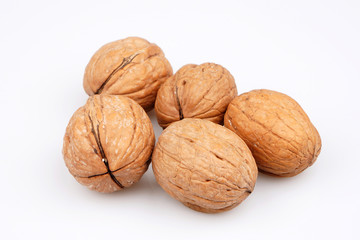 Some Organic walnut on white background. Top view