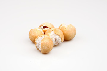 Salted peanuts with a little sauce on white ground