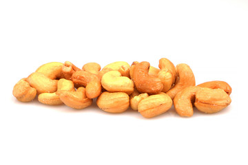 Organic cashew nuts heap on white background