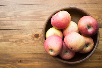 ripe apple on a wooden background