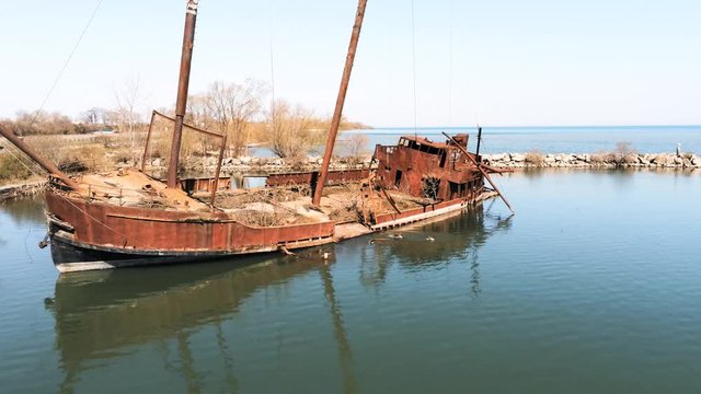 Drone view of sunken shipwreck in harbour