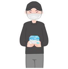 マスクを持つ男性