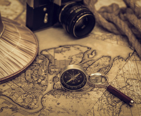 Fototapeta na wymiar vacation travel planning with map, compass
