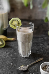 Healthy green smoothie made from banana, kiwi and Chia seeds. Vitamin delicious Breakfast