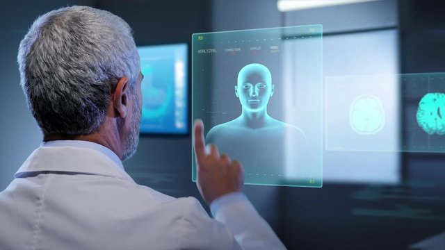 future medical  technology,doctor looking at augmented reallity virtual touchscreen display showing 3d graphics of brain heart and human body

