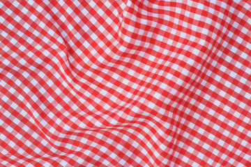 Picnic table cloth. Seamless checkered pattern. Vintage red plaid fabric texture. 