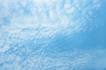 Blue sky and clouds background.