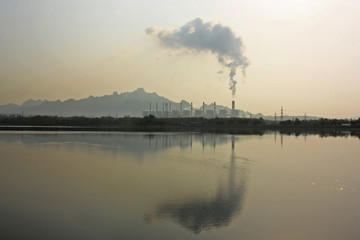 Power Plant with wetland or reservoir.