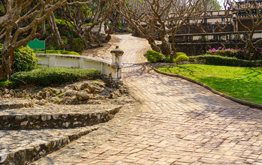 Fototapeta na wymiar Corridor that is laid with old bricks of the beauty of Phra Nakhon Khiri Historical Park (Khao Wang), Thailand.