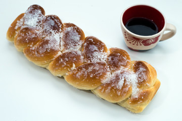 Sweet bread with extraordinary good taste and a cup of coffee