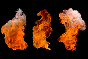 flame is burning on a black background There are three beautiful flames  Suitable for making...
