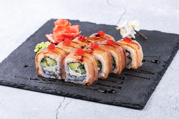 japanese sushi food. Maki ands rolls with tuna, salmon, shrimp, crab and avocado.