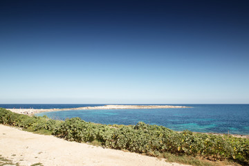 Fototapeta na wymiar Qawra Point Beach in malta