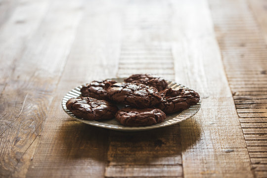 Original dark chocolate cookies in a rustic environment